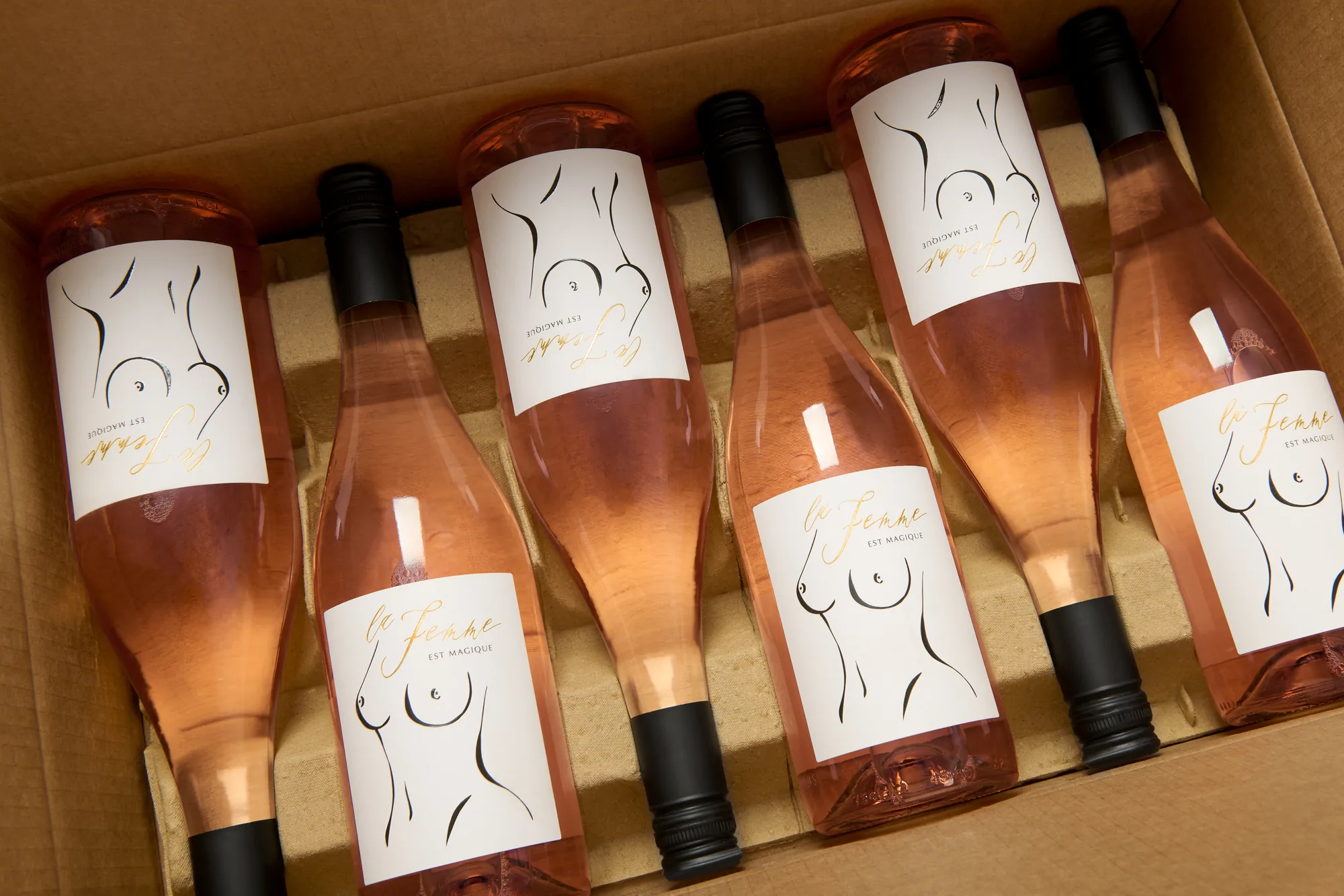 Single bottle of La Femme est Magique in its branded gift box